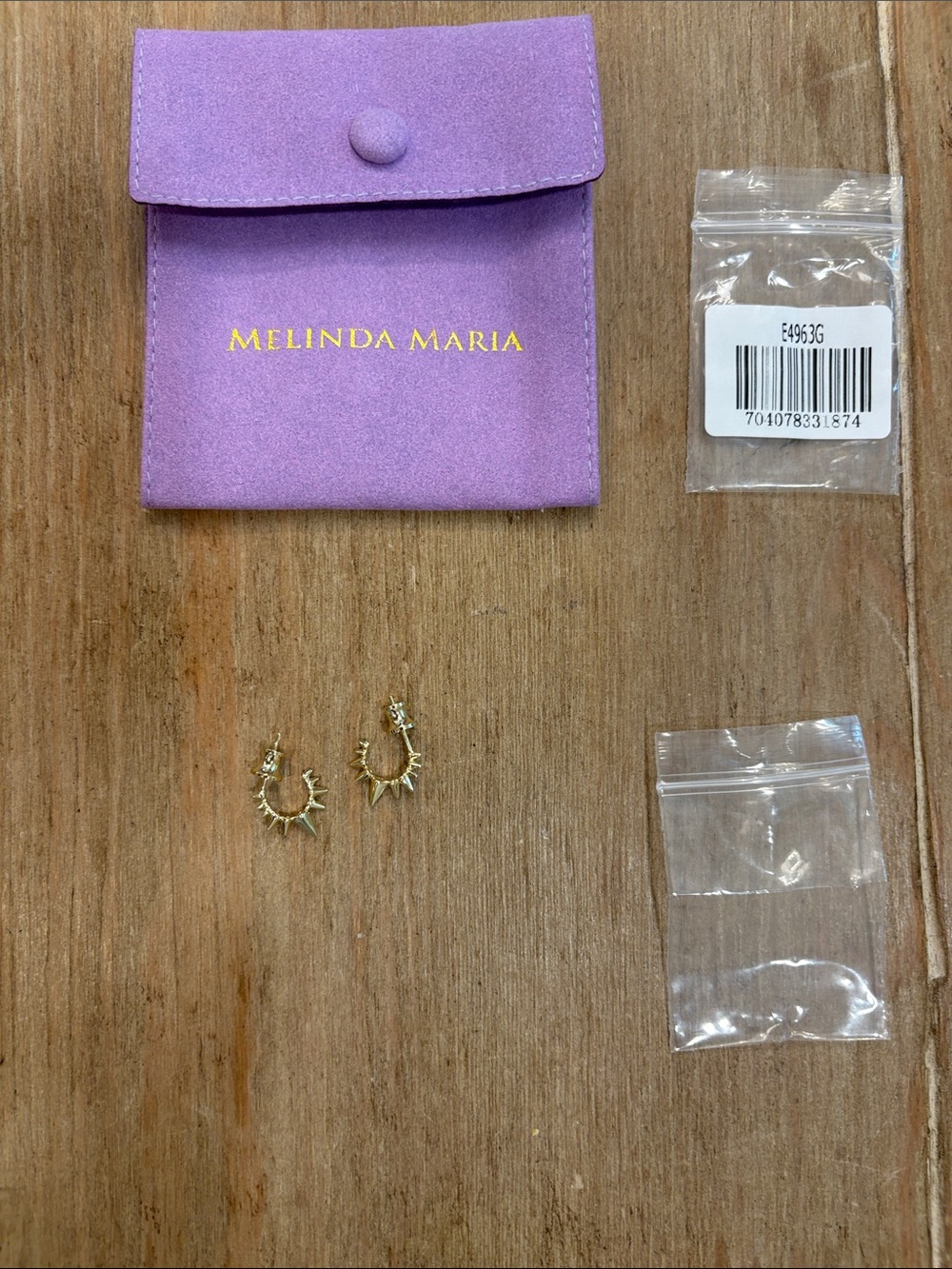 Melinda Maria small Gold Spike Hoop Earrings in Purple Pouch